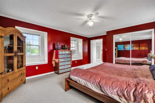 712 14 Street Se, Calgary, AB - Indoor Photo Showing Bedroom