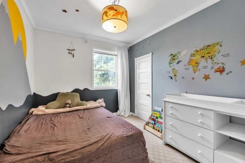 712 14 Street Se, Calgary, AB - Indoor Photo Showing Bedroom