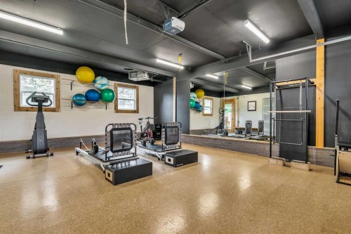 712 14 Street Se, Calgary, AB - Indoor Photo Showing Gym Room