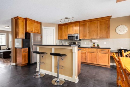 159 Cimarron Grove Crescent, Okotoks, AB - Indoor Photo Showing Kitchen
