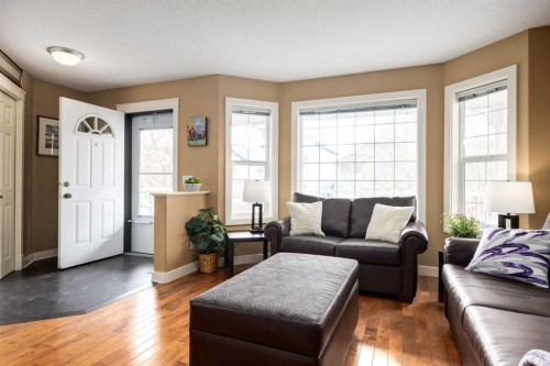159 Cimarron Grove Crescent, Okotoks, AB - Indoor Photo Showing Living Room