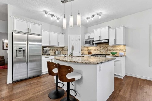 13 Cougar Ridge Circle Sw, Calgary, AB - Indoor Photo Showing Kitchen With Stainless Steel Kitchen With Upgraded Kitchen