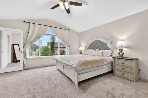 13 Cougar Ridge Circle Sw, Calgary, AB - Indoor Photo Showing Bedroom
