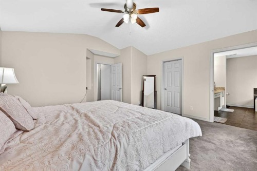 13 Cougar Ridge Circle Sw, Calgary, AB - Indoor Photo Showing Bedroom