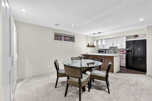 13 Cougar Ridge Circle Sw, Calgary, AB - Indoor Photo Showing Dining Room