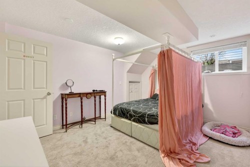13 Cougar Ridge Circle Sw, Calgary, AB - Indoor Photo Showing Bedroom