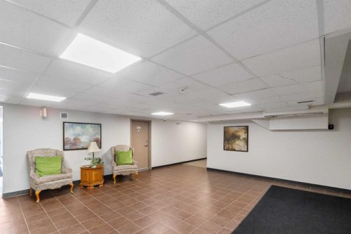 2327-700 Willowbrook Road Nw, Airdrie, AB - Indoor Photo Showing Other Room