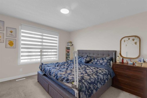 49 Heirloom Crescent Se, Calgary, AB - Indoor Photo Showing Bedroom