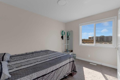 49 Heirloom Crescent Se, Calgary, AB - Indoor Photo Showing Bedroom