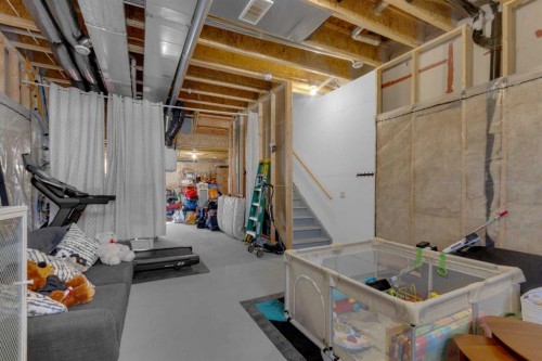 49 Heirloom Crescent Se, Calgary, AB - Indoor Photo Showing Basement