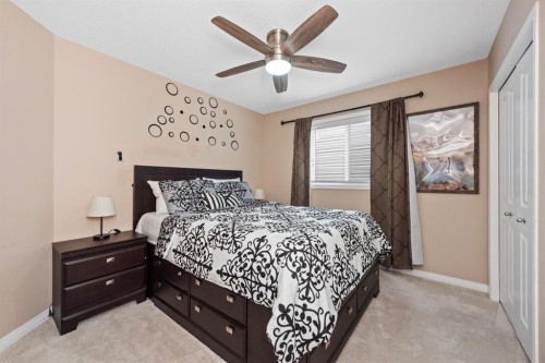 203 Morningside Circle Sw, Airdrie, AB - Indoor Photo Showing Bedroom