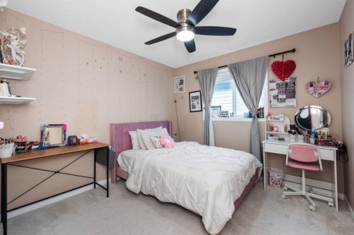 203 Morningside Circle Sw, Airdrie, AB - Indoor Photo Showing Bedroom
