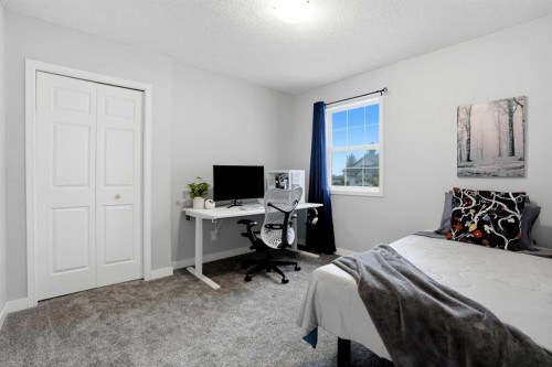 390 Douglas Ridge Circle Se, Calgary, AB - Indoor Photo Showing Bedroom