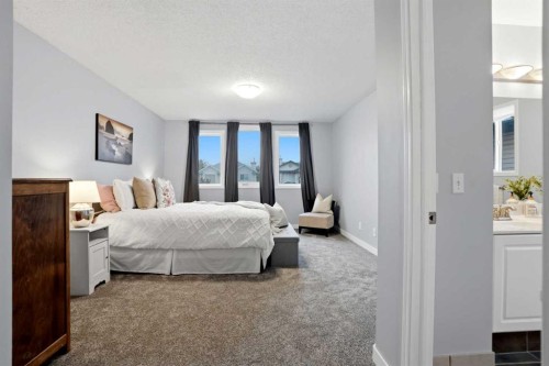 390 Douglas Ridge Circle Se, Calgary, AB - Indoor Photo Showing Bedroom