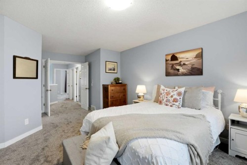 390 Douglas Ridge Circle Se, Calgary, AB - Indoor Photo Showing Bedroom