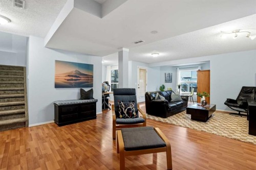 390 Douglas Ridge Circle Se, Calgary, AB - Indoor Photo Showing Living Room