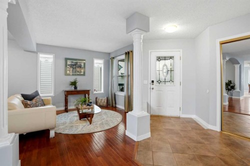 390 Douglas Ridge Circle Se, Calgary, AB - Indoor Photo Showing Living Room