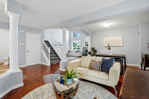 390 Douglas Ridge Circle Se, Calgary, AB - Indoor Photo Showing Living Room