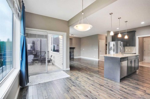 3 Sunset Court, Cochrane, AB - Indoor Photo Showing Kitchen With Double Sink With Upgraded Kitchen