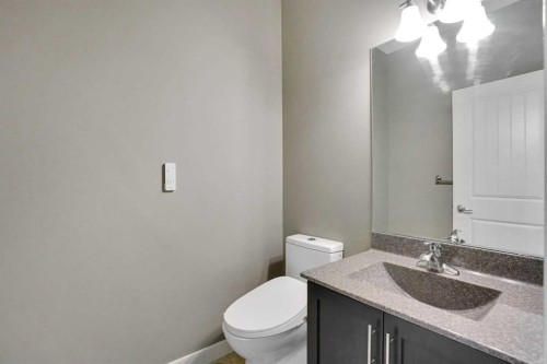 3 Sunset Court, Cochrane, AB - Indoor Photo Showing Kitchen With Upgraded Kitchen