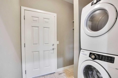 3 Sunset Court, Cochrane, AB - Indoor Photo Showing Other Room