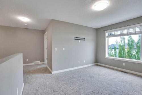 3 Sunset Court, Cochrane, AB - Indoor Photo Showing Other Room