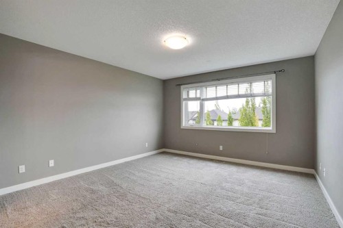 3 Sunset Court, Cochrane, AB - Indoor Photo Showing Other Room