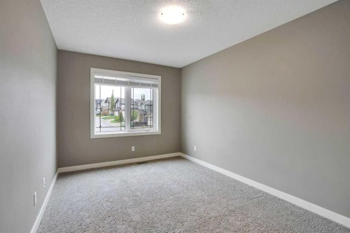 3 Sunset Court, Cochrane, AB - Indoor Photo Showing Other Room