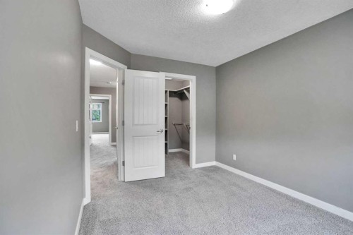 3 Sunset Court, Cochrane, AB - Indoor Photo Showing Other Room