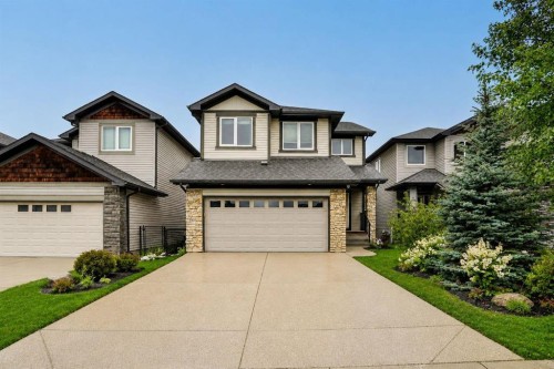 3 Sunset Court, Cochrane, AB - Outdoor With Facade