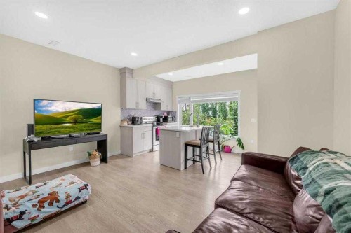 3 Sunset Court, Cochrane, AB - Indoor Photo Showing Other Room