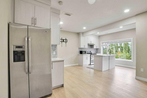 3 Sunset Court, Cochrane, AB - Indoor With Storage
