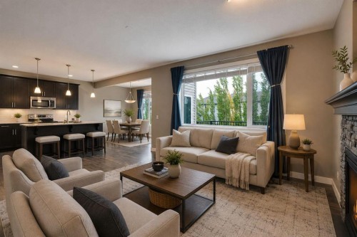 3 Sunset Court, Cochrane, AB - Indoor Photo Showing Living Room With Fireplace