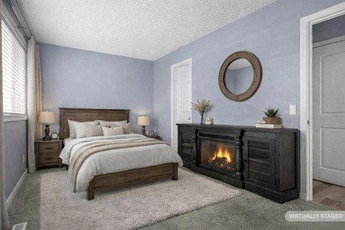 72 Marquis Place Se, Airdrie, AB - Indoor Photo Showing Bedroom