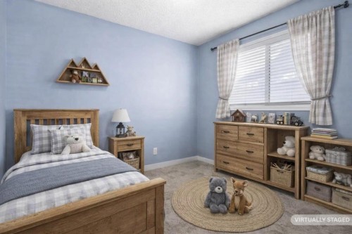 72 Marquis Place Se, Airdrie, AB - Indoor Photo Showing Bedroom
