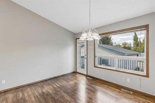 121 Quigley Drive, Cochrane, AB - Indoor Photo Showing Other Room