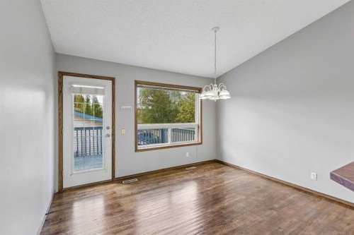 121 Quigley Drive, Cochrane, AB - Indoor Photo Showing Other Room