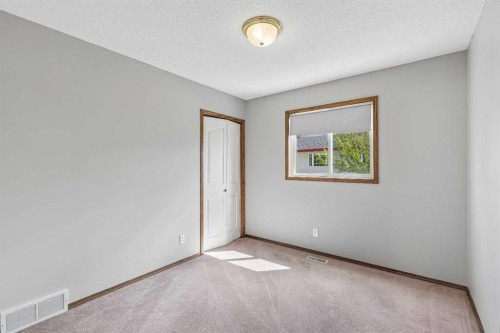 121 Quigley Drive, Cochrane, AB - Indoor Photo Showing Other Room