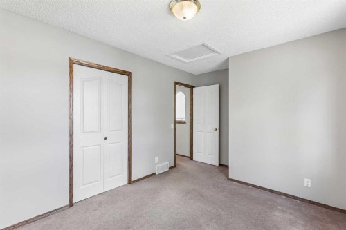 121 Quigley Drive, Cochrane, AB - Indoor Photo Showing Other Room