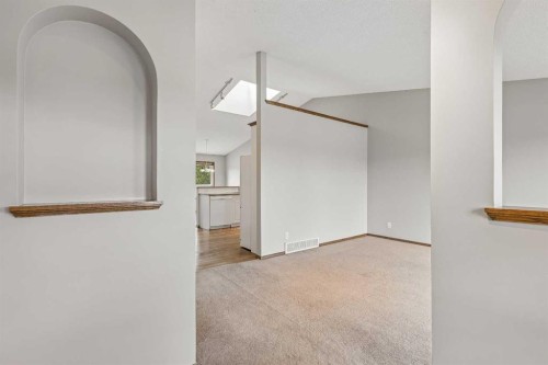 121 Quigley Drive, Cochrane, AB - Indoor Photo Showing Other Room
