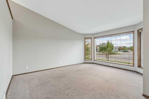 121 Quigley Drive, Cochrane, AB - Indoor Photo Showing Other Room