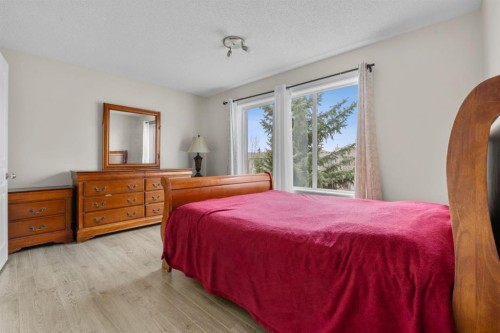 27 Bridleridge View Sw, Calgary, AB - Indoor Photo Showing Bedroom