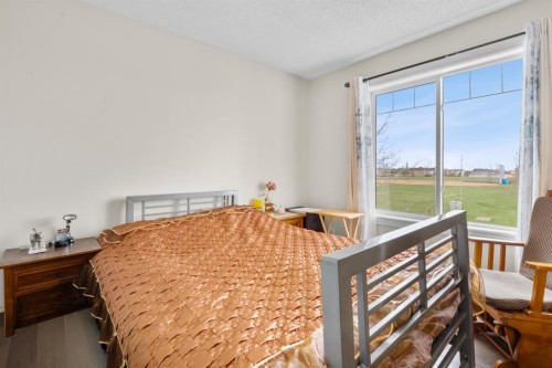 27 Bridleridge View Sw, Calgary, AB - Indoor Photo Showing Bedroom