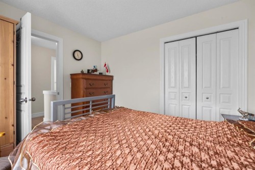 27 Bridleridge View Sw, Calgary, AB - Indoor Photo Showing Bedroom