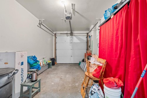 27 Bridleridge View Sw, Calgary, AB - Indoor Photo Showing Garage