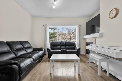 27 Bridleridge View Sw, Calgary, AB - Indoor Photo Showing Living Room