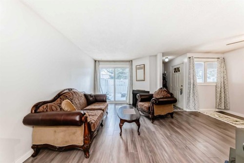 25-3745 Fonda Way Se, Calgary, AB - Indoor Photo Showing Living Room
