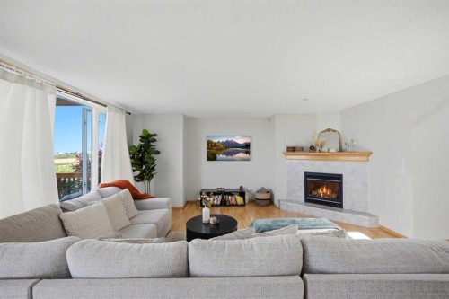 101 Coville Crescent Ne, Calgary, AB - Indoor Photo Showing Living Room With Fireplace