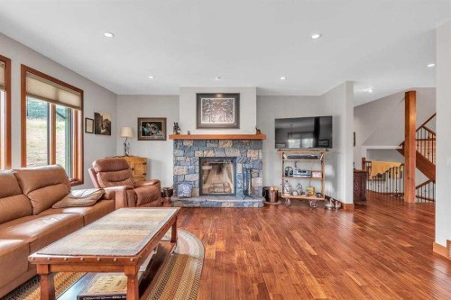 64134-265 West Road, Rural Bighorn No. 8, M.D. Of, AB - Indoor Photo Showing Living Room With Fireplace