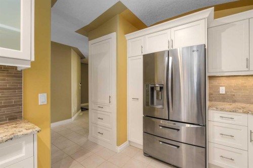 35 Prominence Path Sw, Calgary, AB - Indoor Photo Showing Kitchen